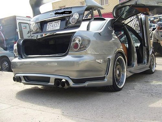 Illustration for article titled World's Most Hideous Nissan Maxima Found In Kuwait